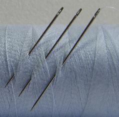 three sizes of Spiral Eye Side Threading needles